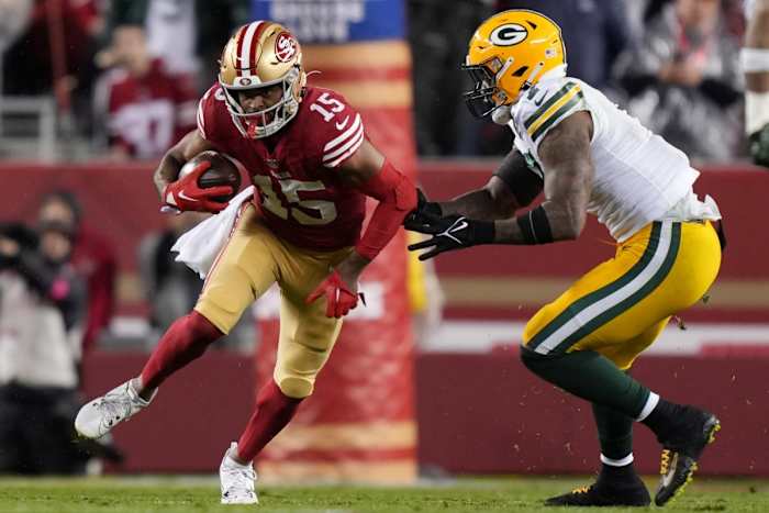 January 20, 2024; San Francisco 49ers receiver Jauan Jennings (15) runs after a catch against Green Bay Packers linebacker Quay Walker (7). Mandatory Credit: Kyle Terada-USA TODAY Sports